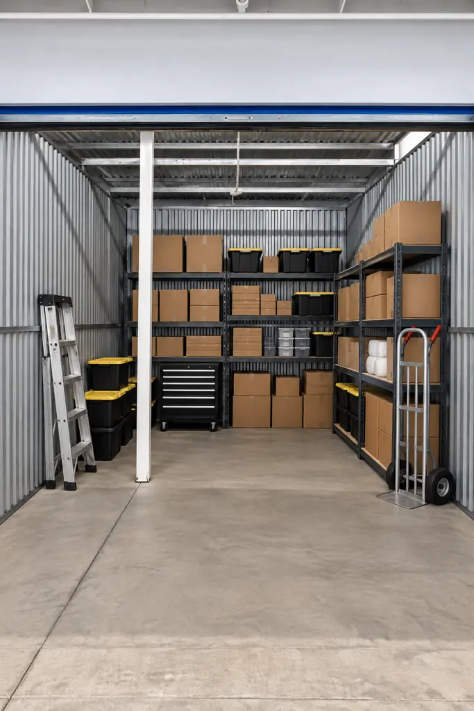 Business storage unit with shelving, boxes and inventory