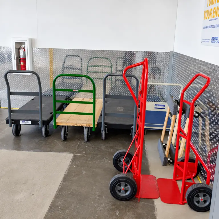 Moving carts and red dollies at Midwest Indoor Storage in Rochester North, MN